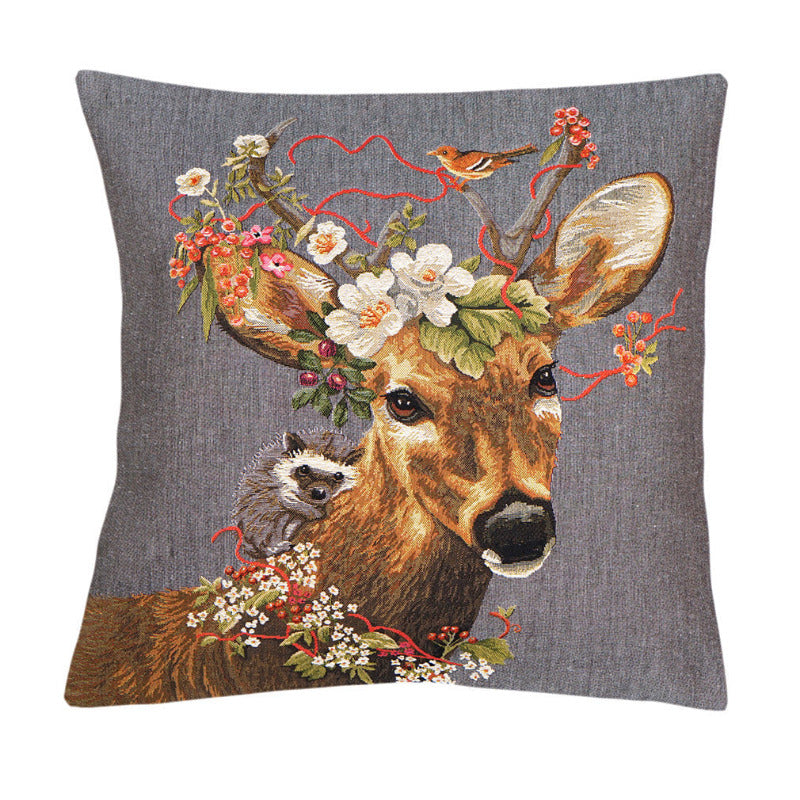 Rehbock und Igel auf einem Gobelinkissen