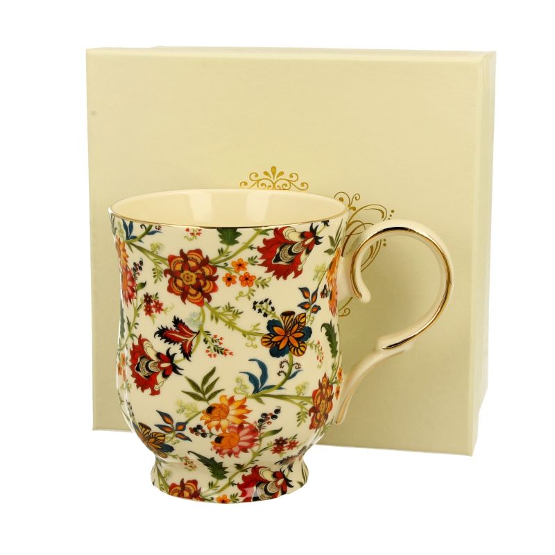 Tasse mit Goldrand und Blüten